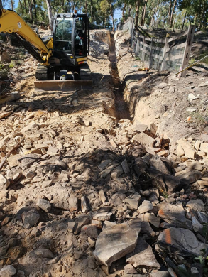 Trench digging & Pipe preparation Trench digging & Pipe preparation rural property with sandstone and clay